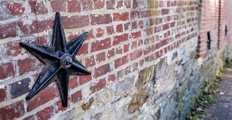 metal star on house means|cast iron stars on buildings.